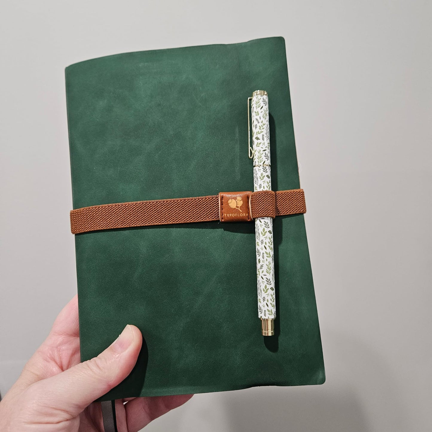 Notebook Strap With Pen Holder In Rust (1 piece) Typoflora